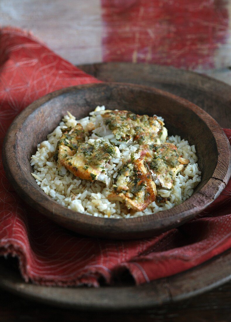 Herb fish on a bed of rice (India)