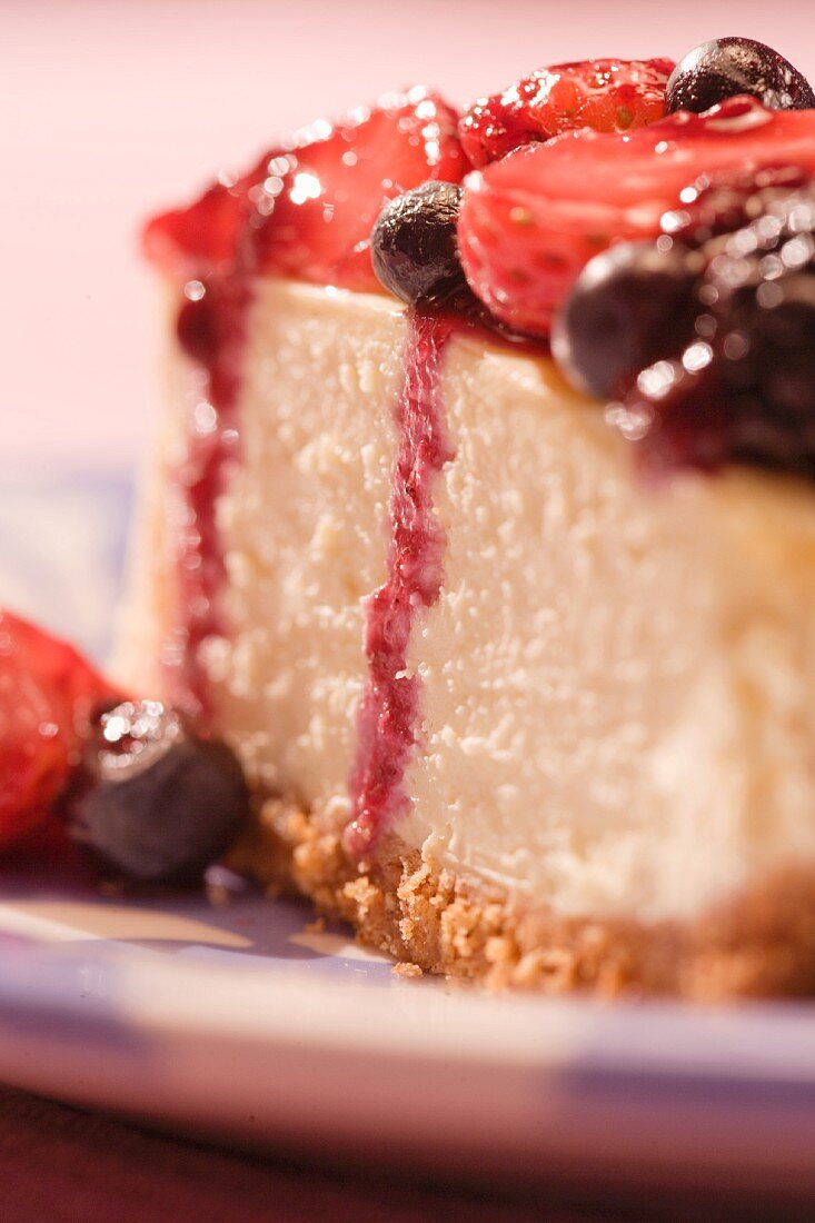 A slice of moist berry cheesecake