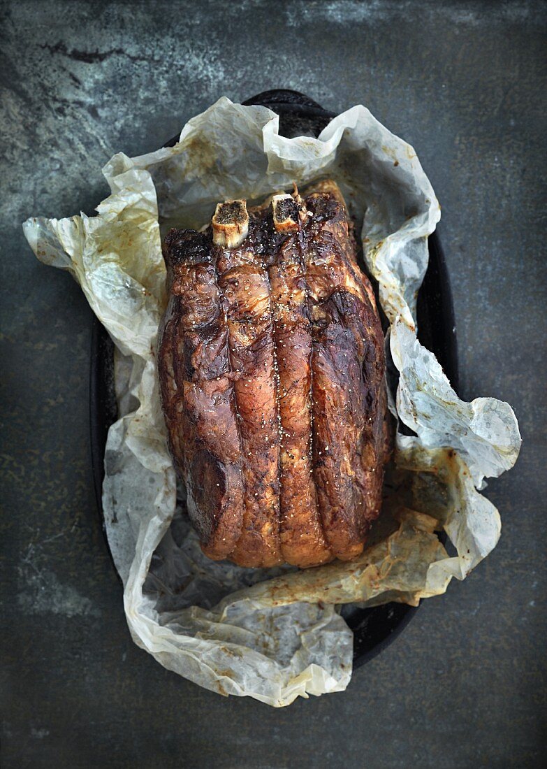 Roasted beef ribs in parchment paper
