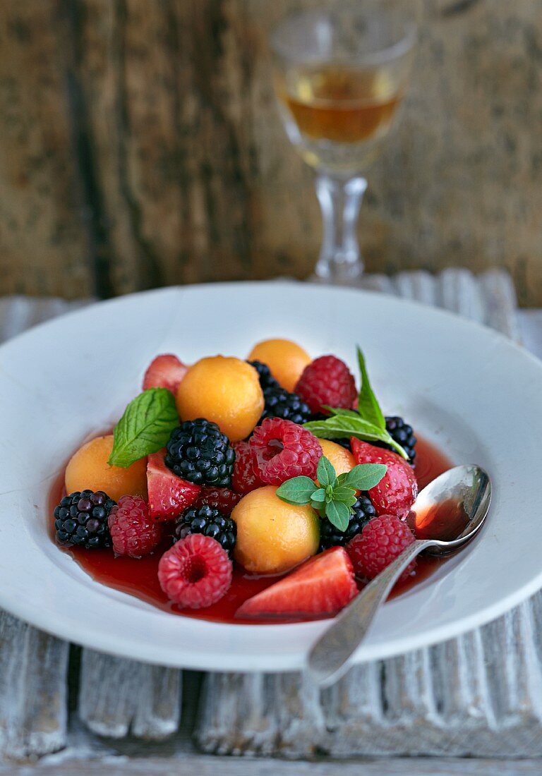 Colourful fruit and berry salad