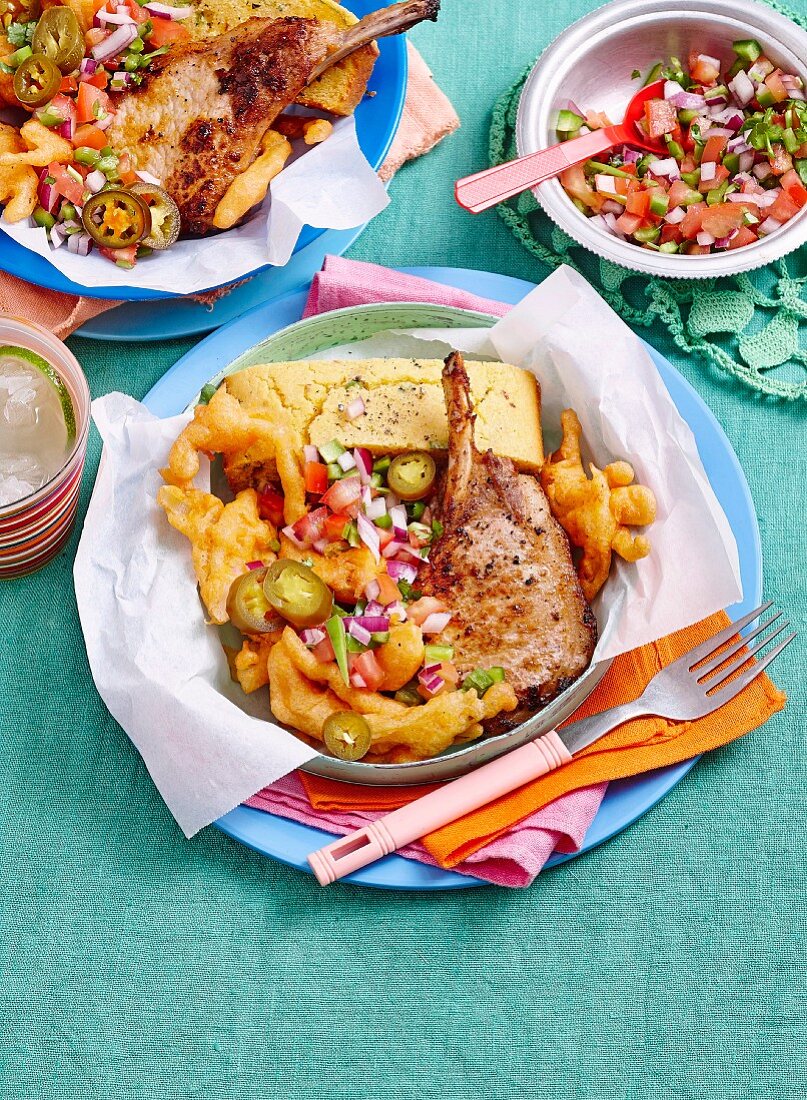 Mexican style pork chops with corn bread and fried onions