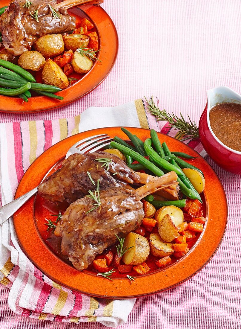 Braised lamb shanks with cranberry sauce