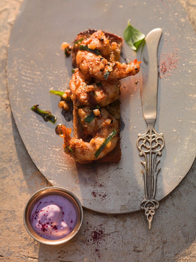 Prawn tikka with purple curry yoghurt