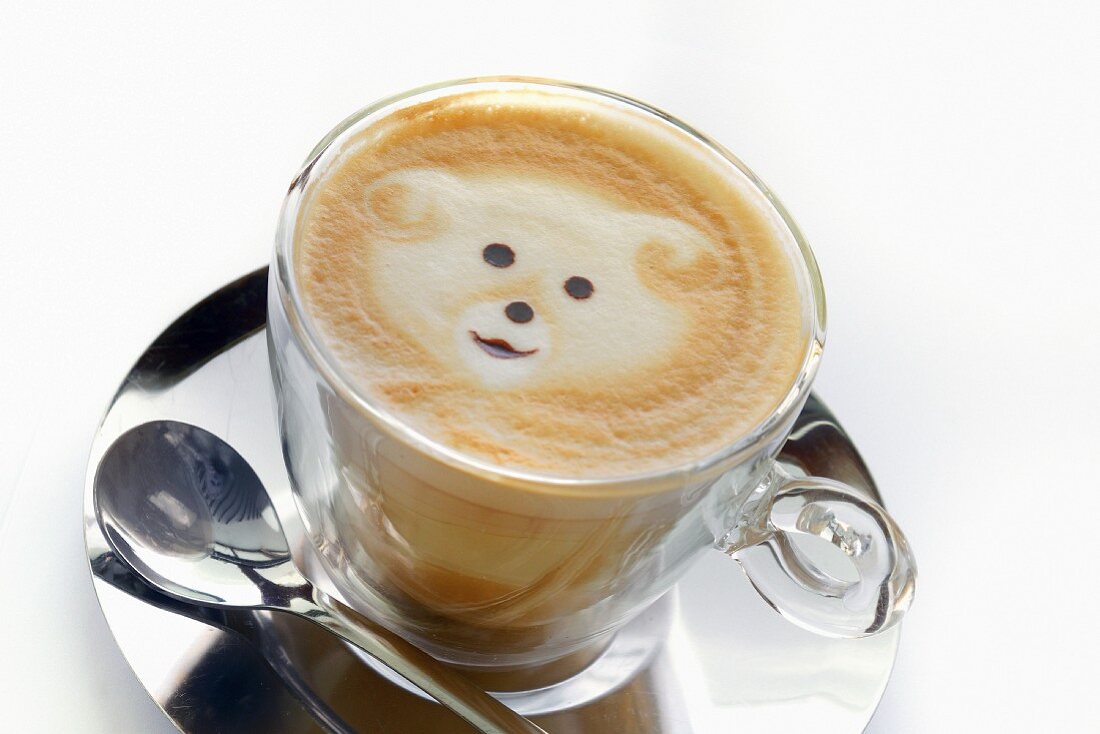 Cappuccino with a bear in the foam