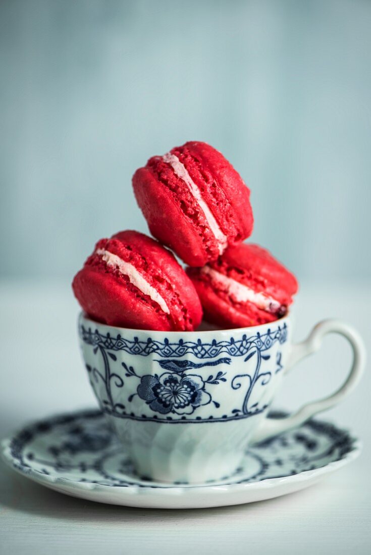 Raspberry macaroons in a cup