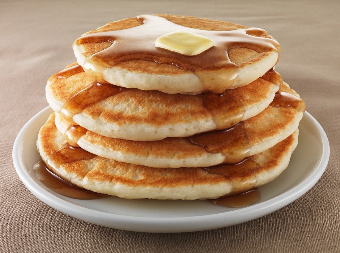 Pancakes with butter and maple syrup