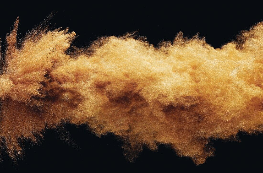 A cloud of golden powder