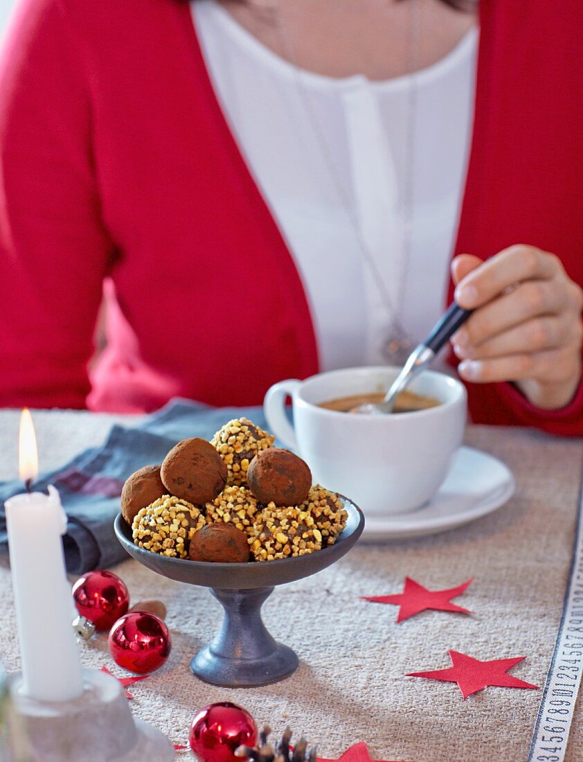 Coffee with brittle truffle pralines for Christmas