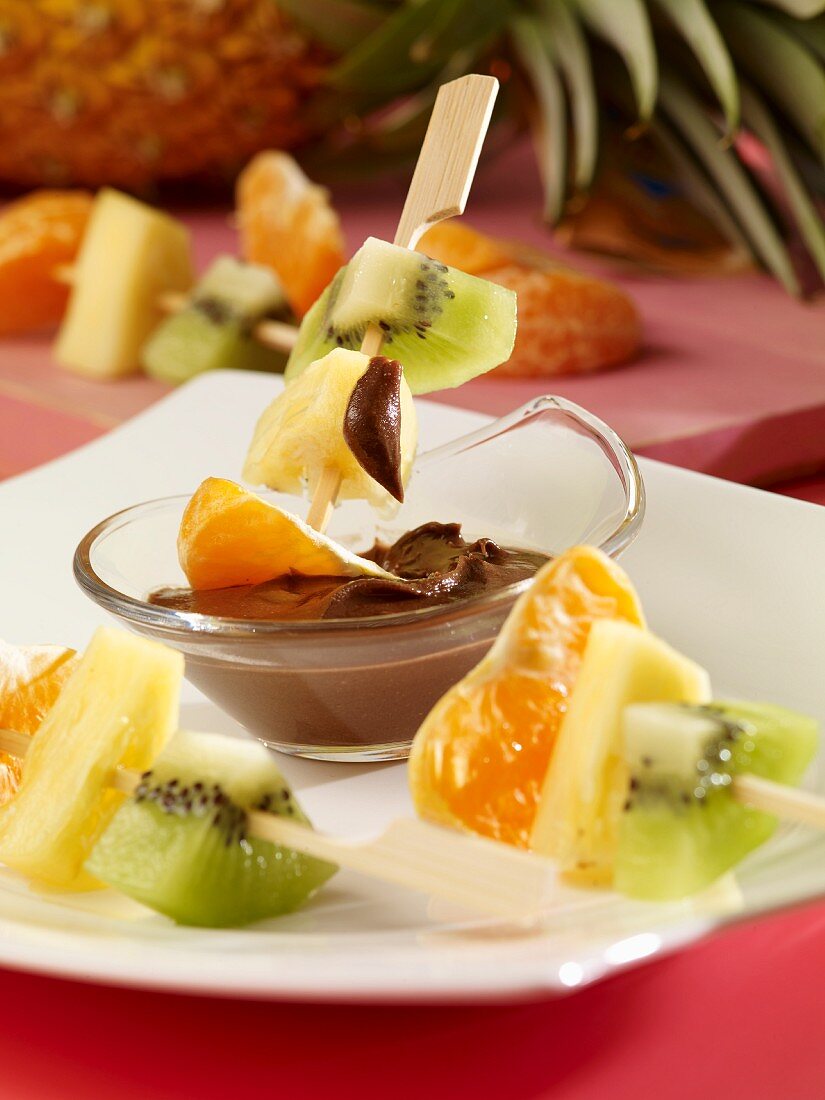 Fruit skewers with chocolate and peanut cream