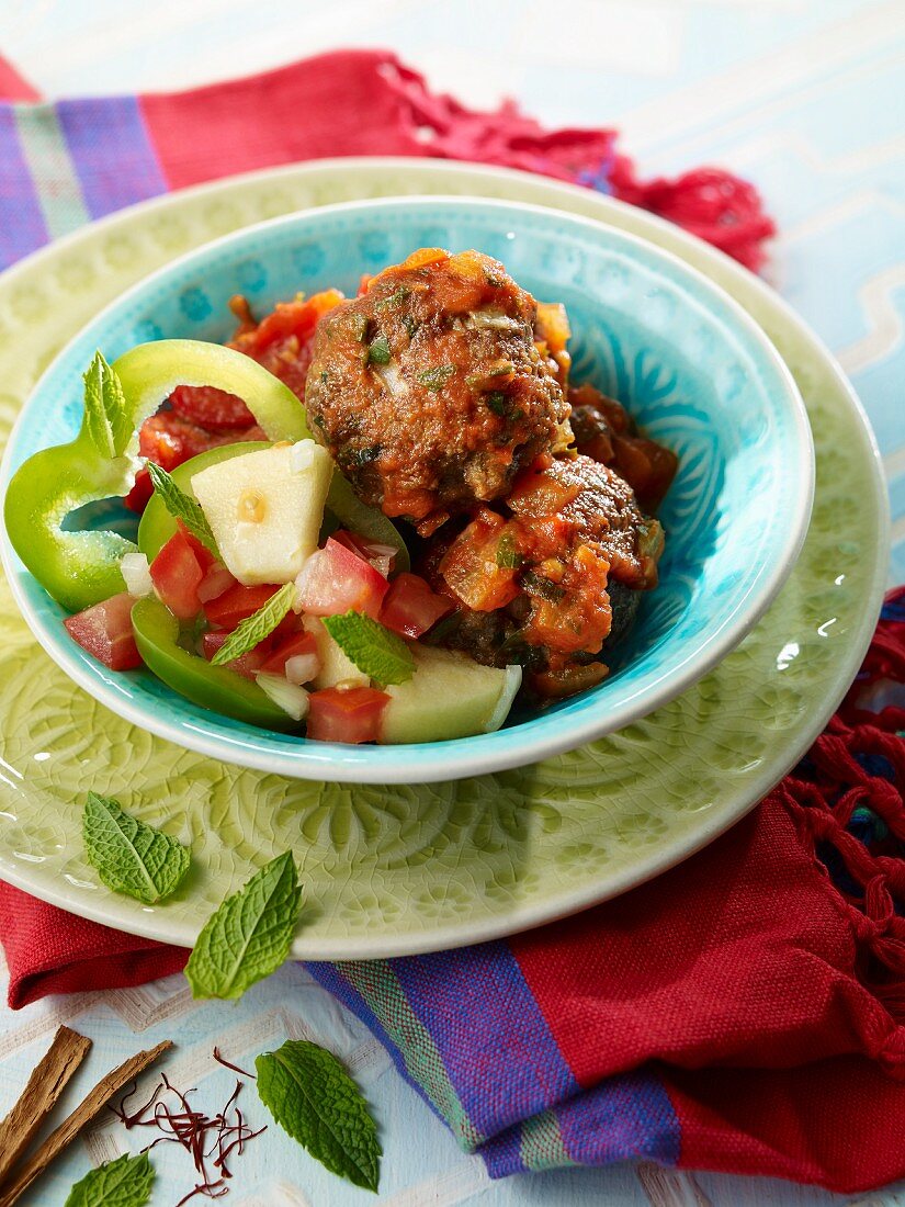 Kefta with a cucumber and pepper salad