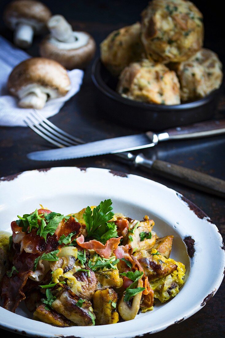 Leftover bread dumplings with mushrooms, bacon and parsely