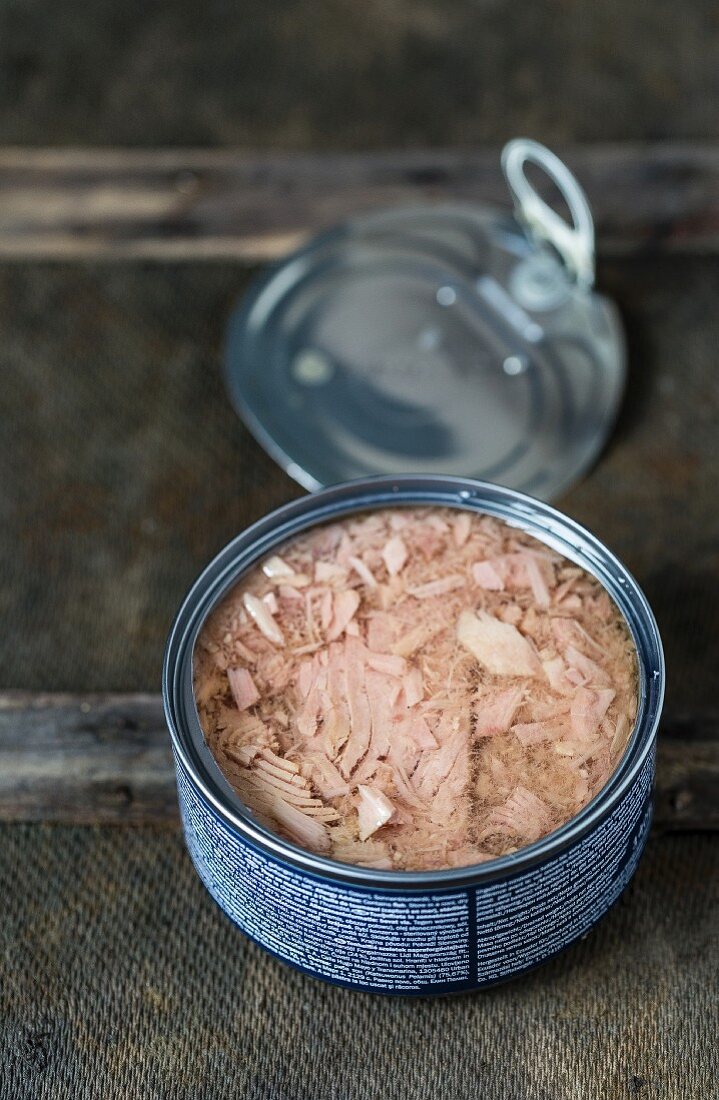 An open tin of tuna fish