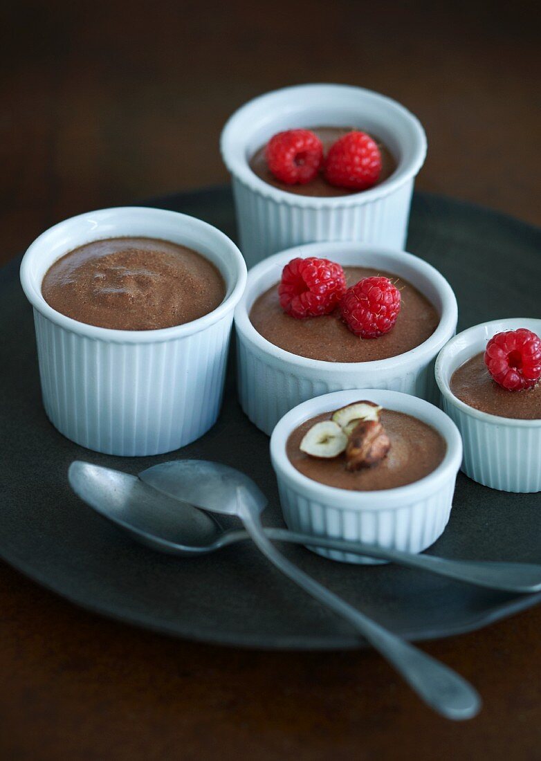 Mousse au chocolat with hazelnuts and raspberries
