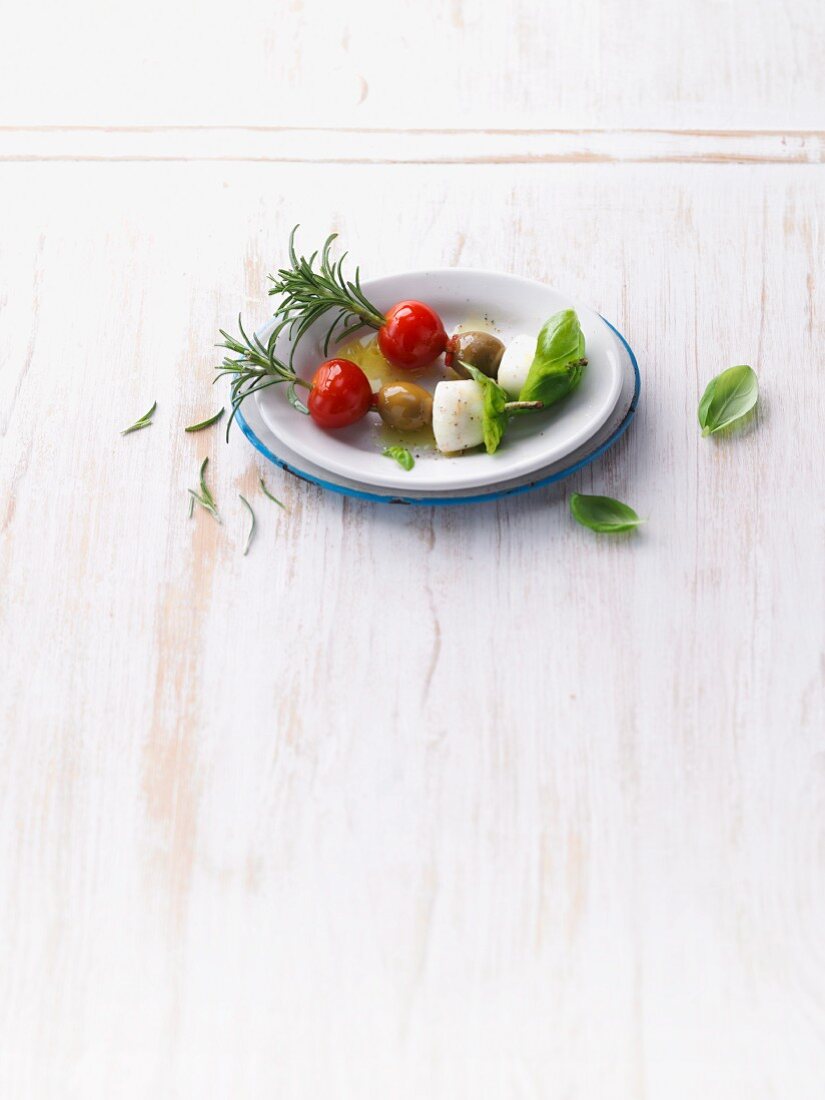 Tomato and mozzarella skewers with rosemary