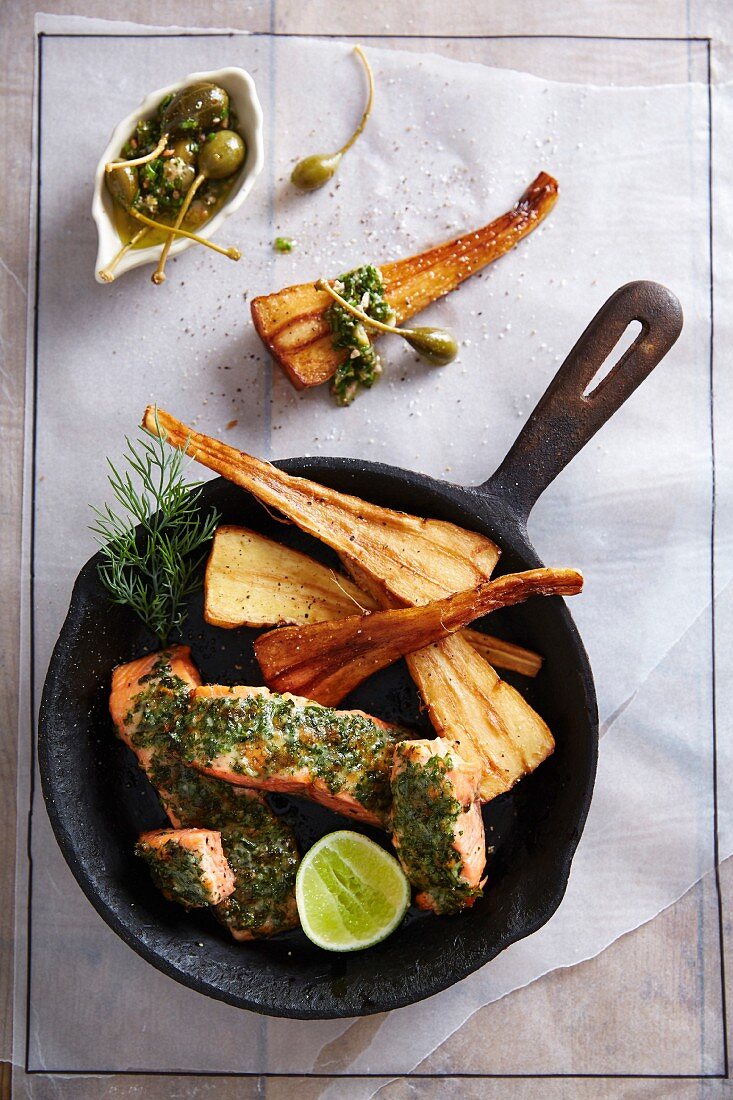 Rainbow trout fillets with a herb crust, parsnips and salsa verde