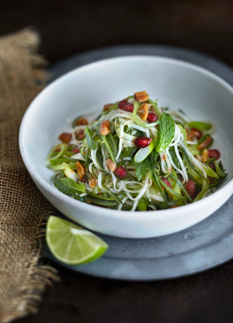 Papaya salad with mint and pomegranate seeds