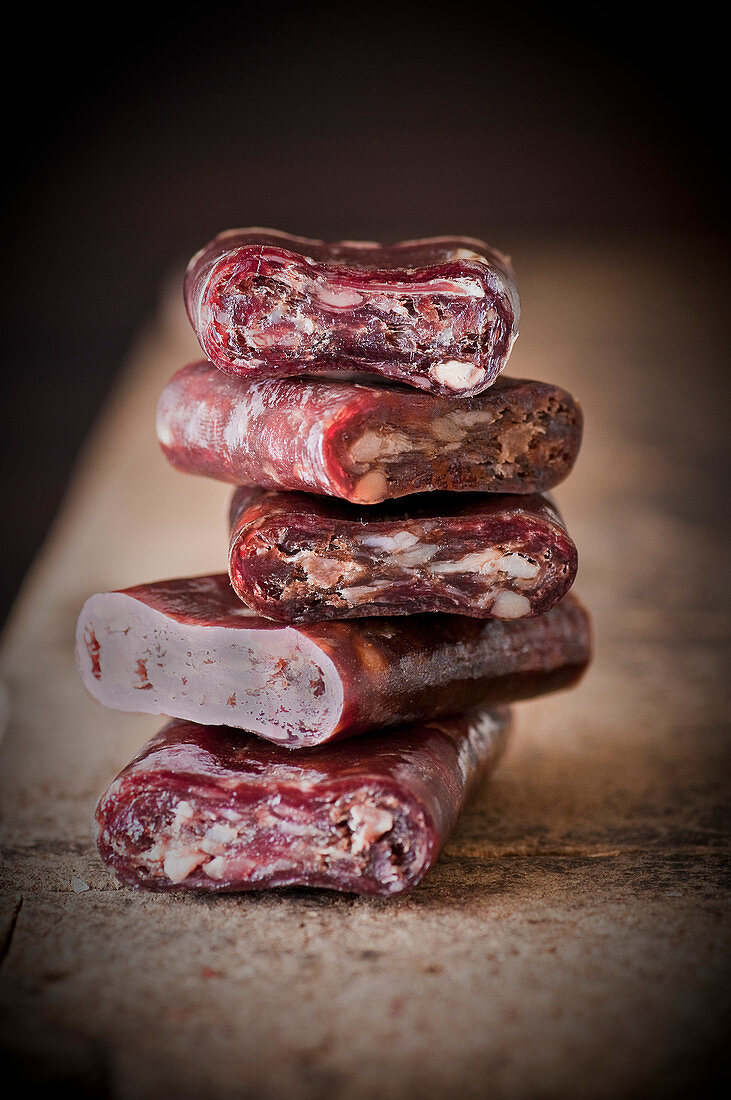 A stack of beef salami chunks