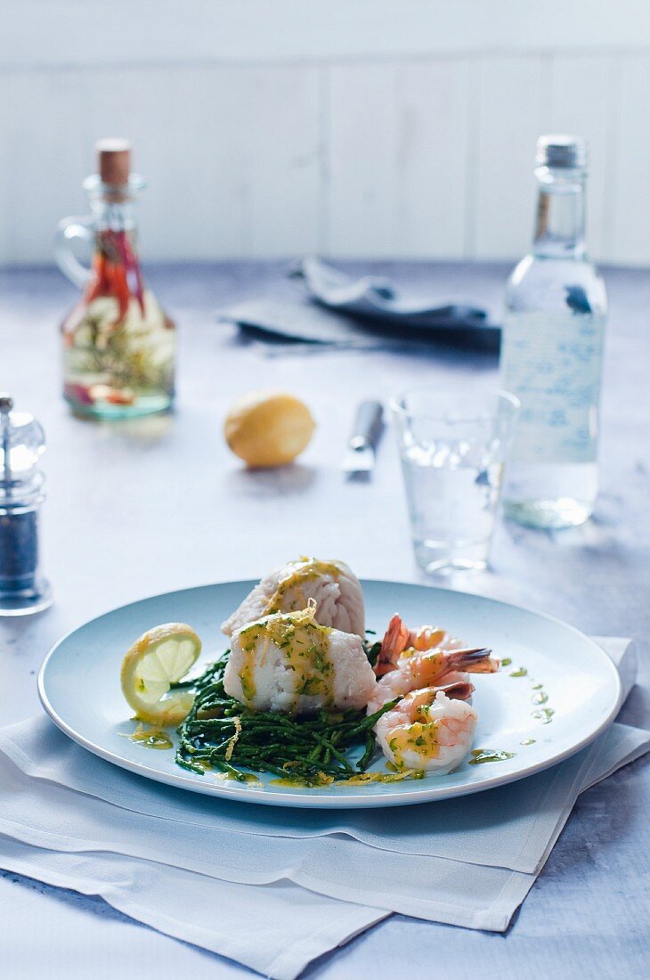 Cod rolls with samphire, king prawns and a butter and parsley sauce