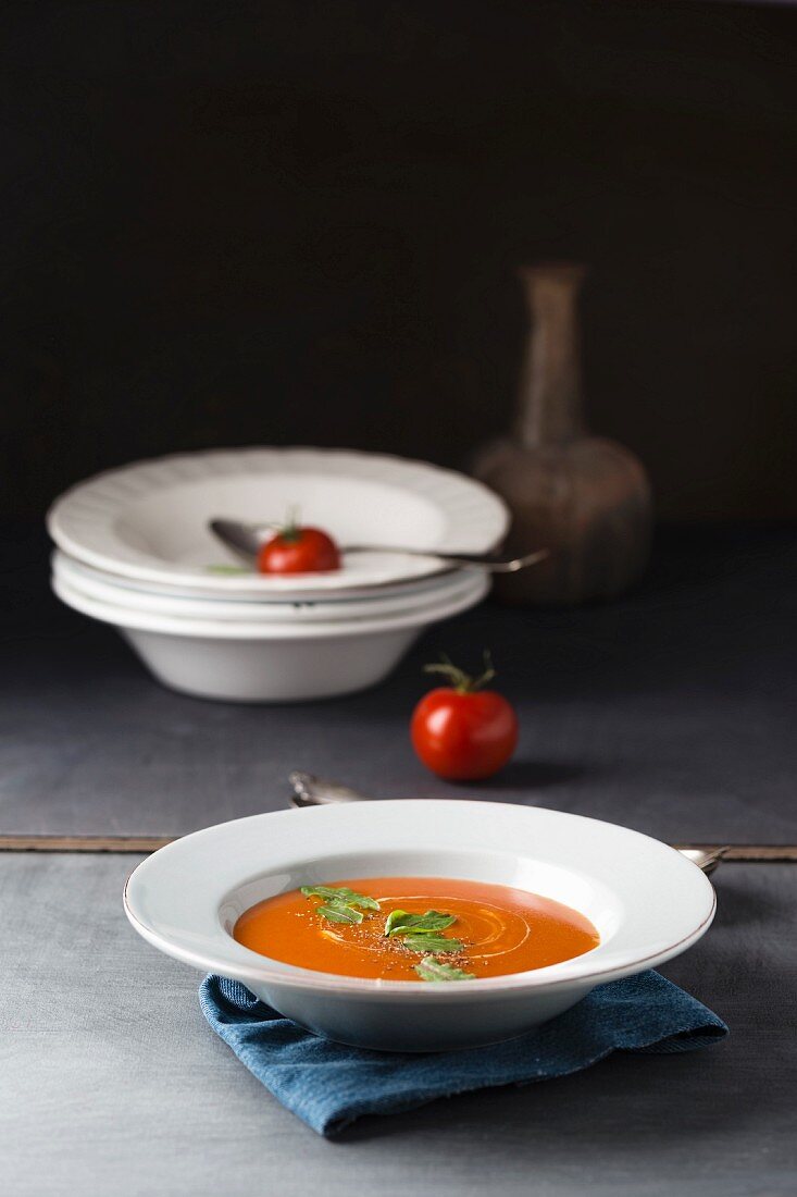 Cream of tomato soup with pepper and sorrel