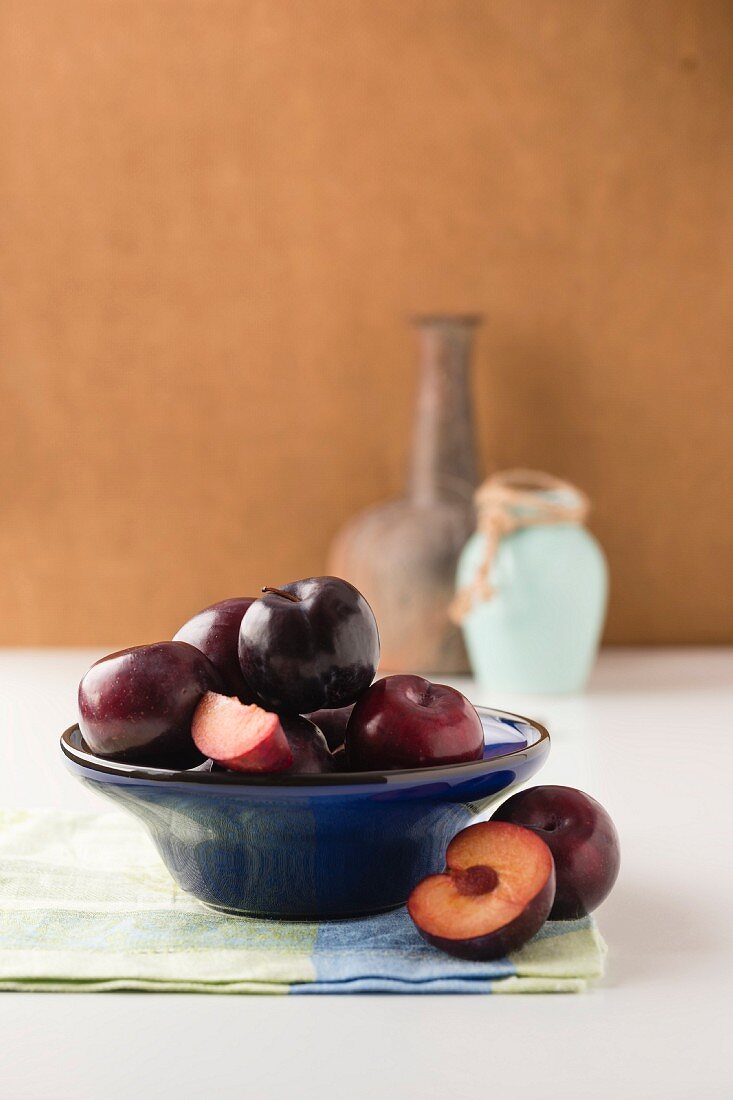 A bowl of fresh plums