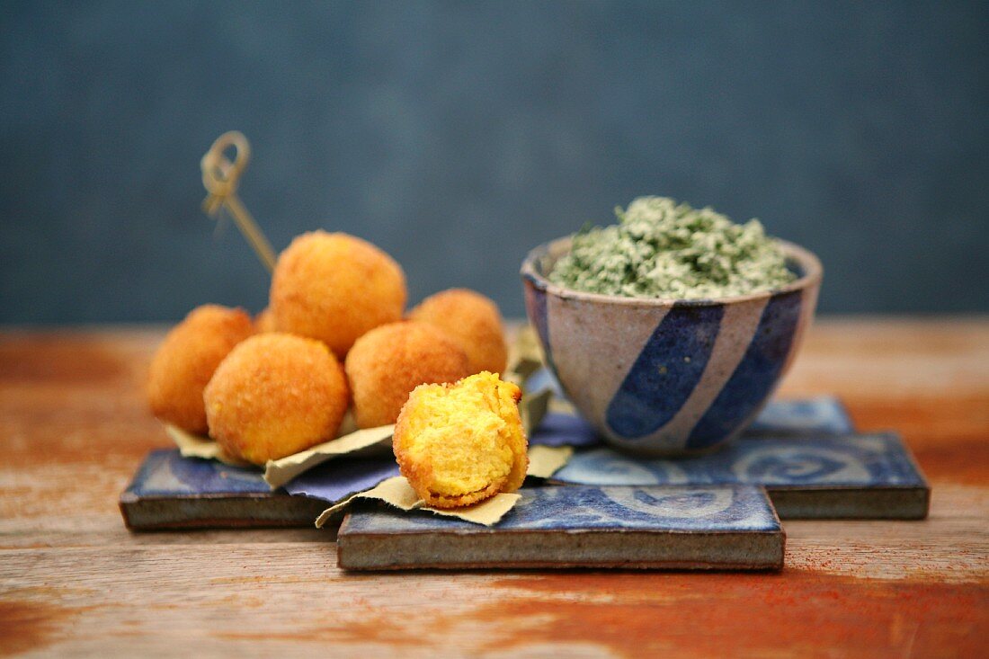 Saffron croquettes with a spinach and ricotta cream