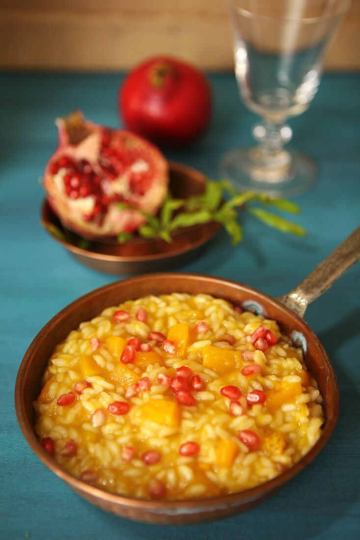 Pumpkin risotto with pomegranate seeds