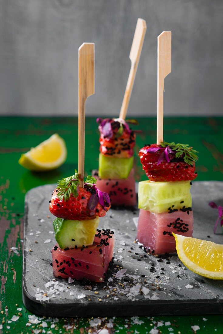 Tuna fish skewers with cucumber and strawberries