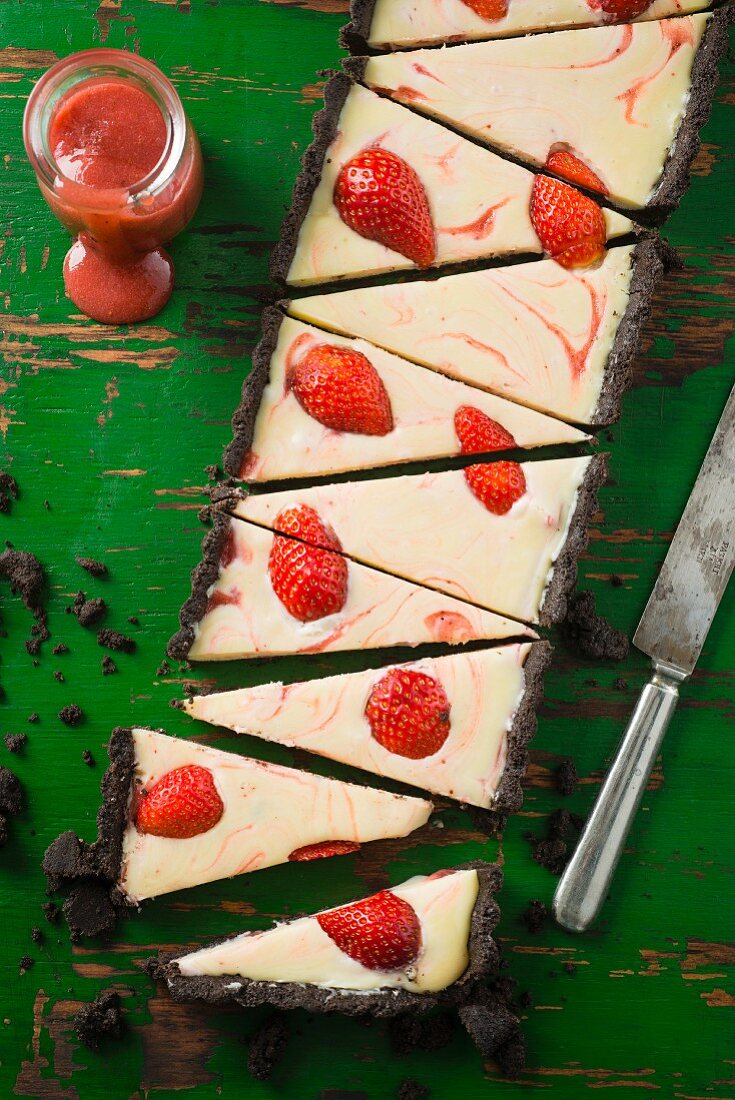 An Oreo chocolate cake with strawberries
