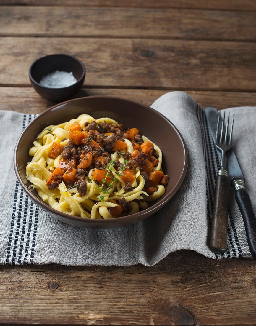 Spätzle (soft egg noodles from Swabia) with a minced meat and pumpkin sauce