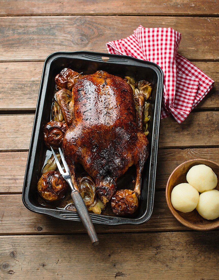 Roast duck with apples