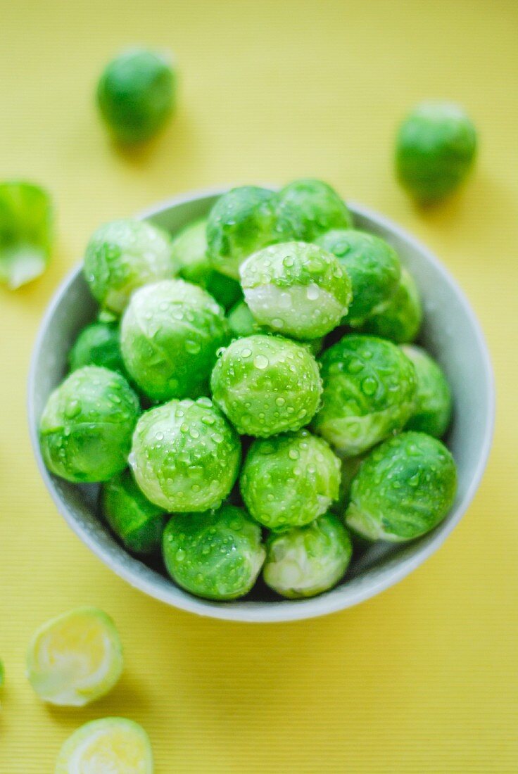 A bowl of freshly washed Brussels sprouts