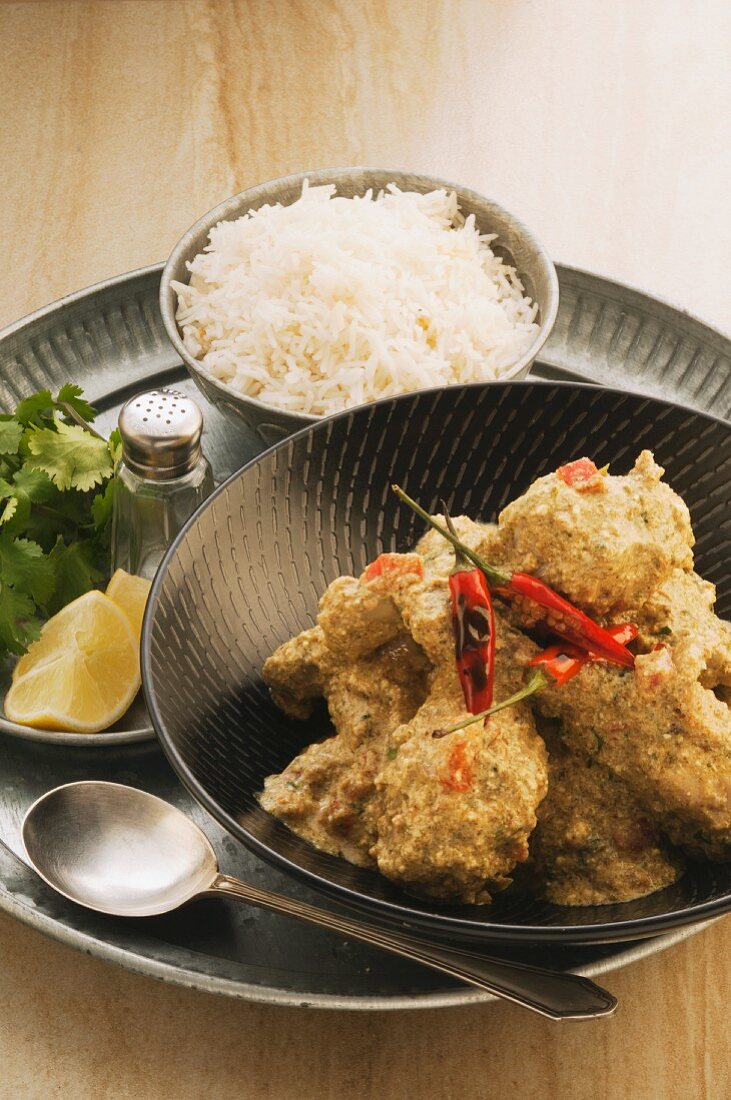 Garlic chicken with chilli peppers and a side of rice