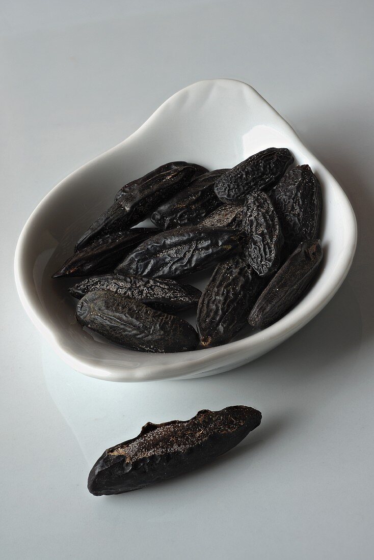 Dried tonka beans in a dish