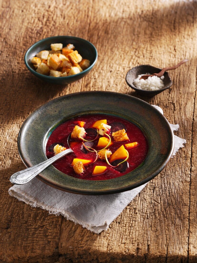 Primeval carrots soup with mango and croutons (vegetarian)