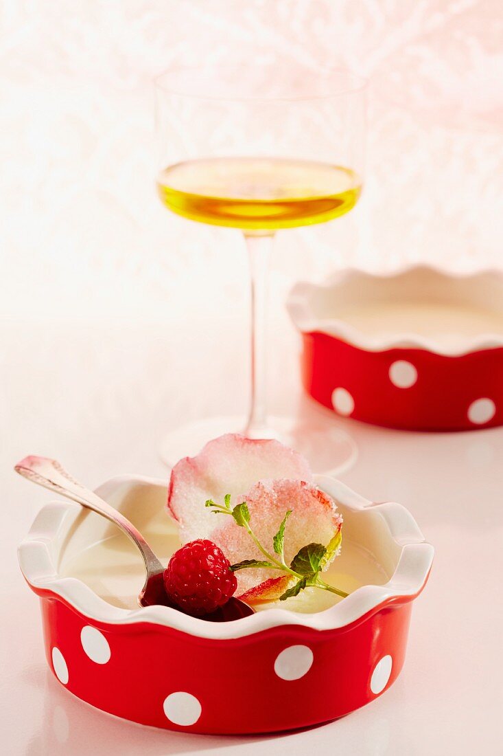 Panna cotta with rose petal syrup and candied rose petals