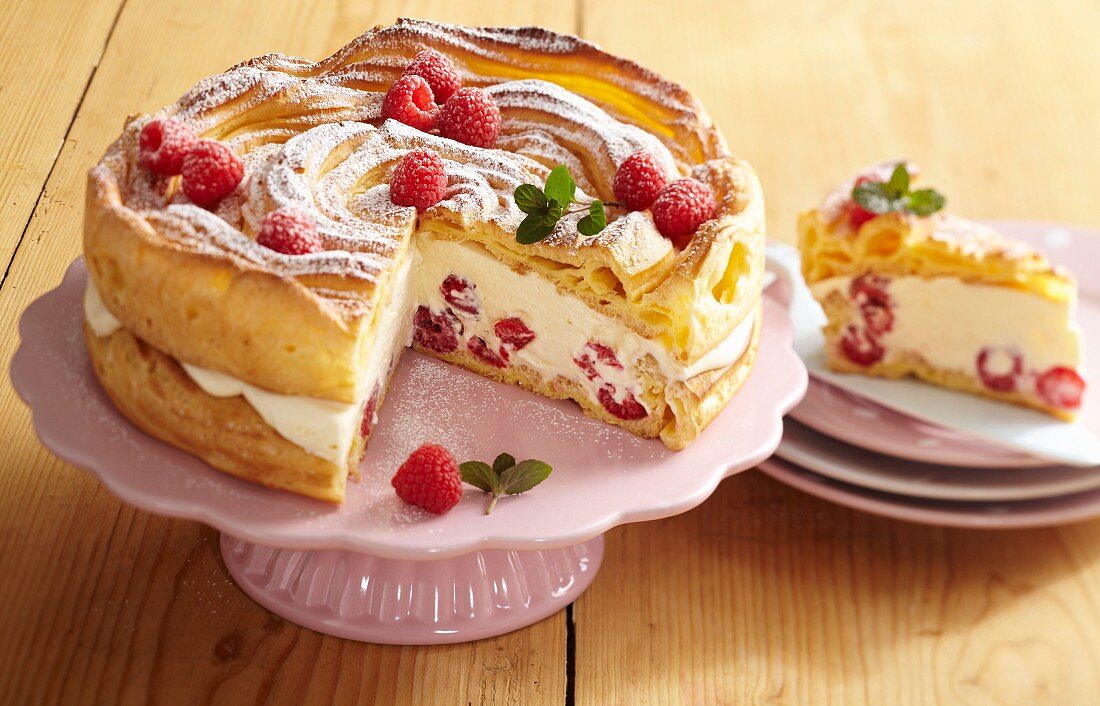 A light creamy cheesecake made from choux pastry with raspberries