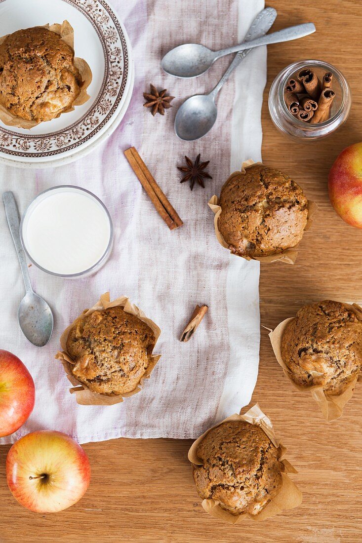 Apple and cinnamon muffins and a glass of milk