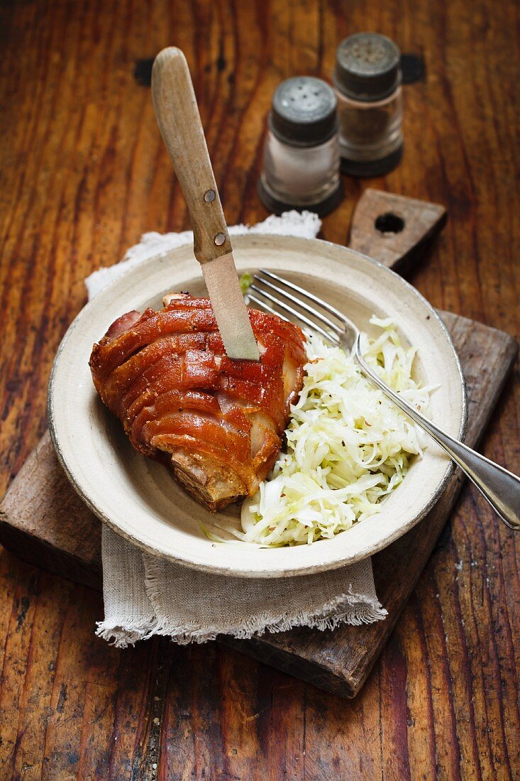 Pork knuckle with coleslaw