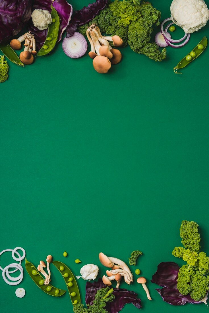 Various vegetables on a green surface