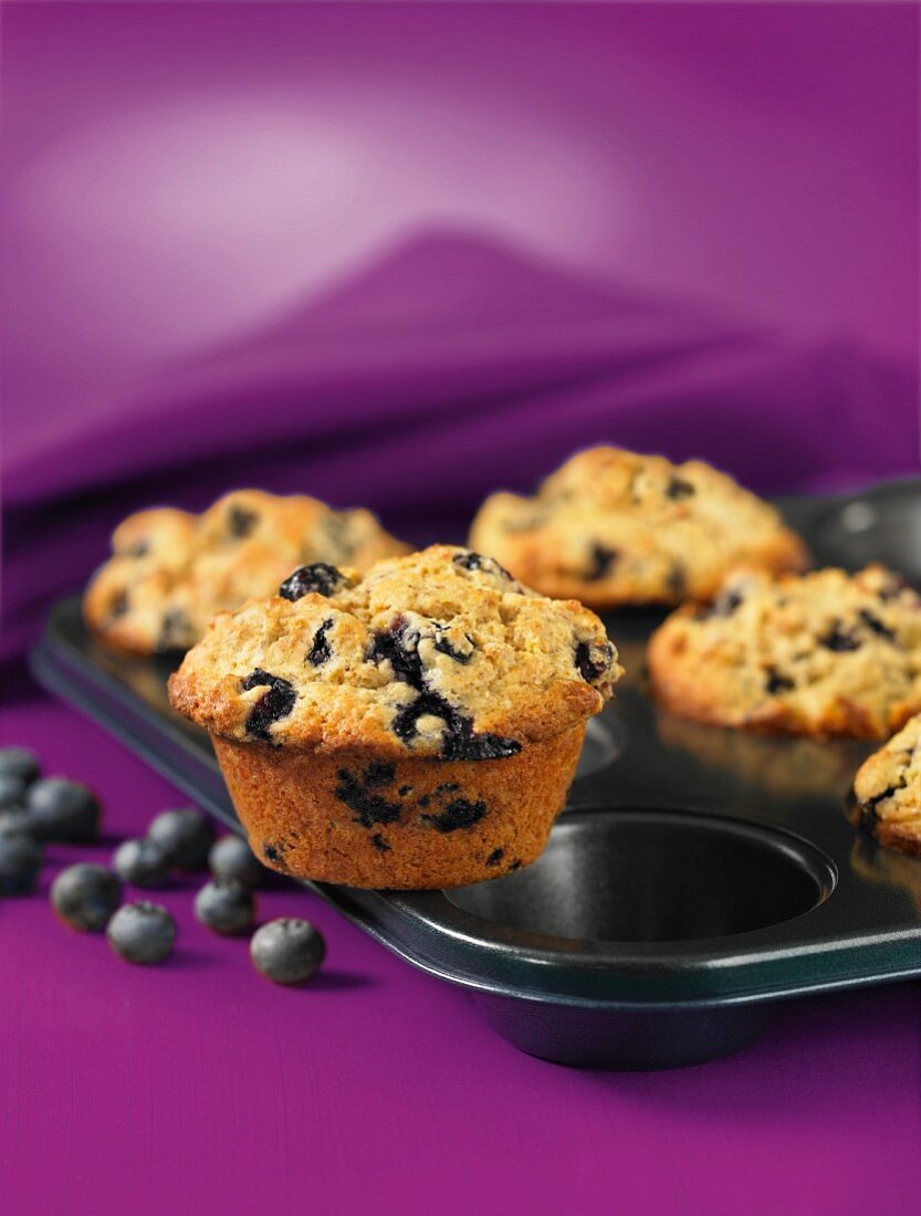 Blueberry muffins in a muffin tin