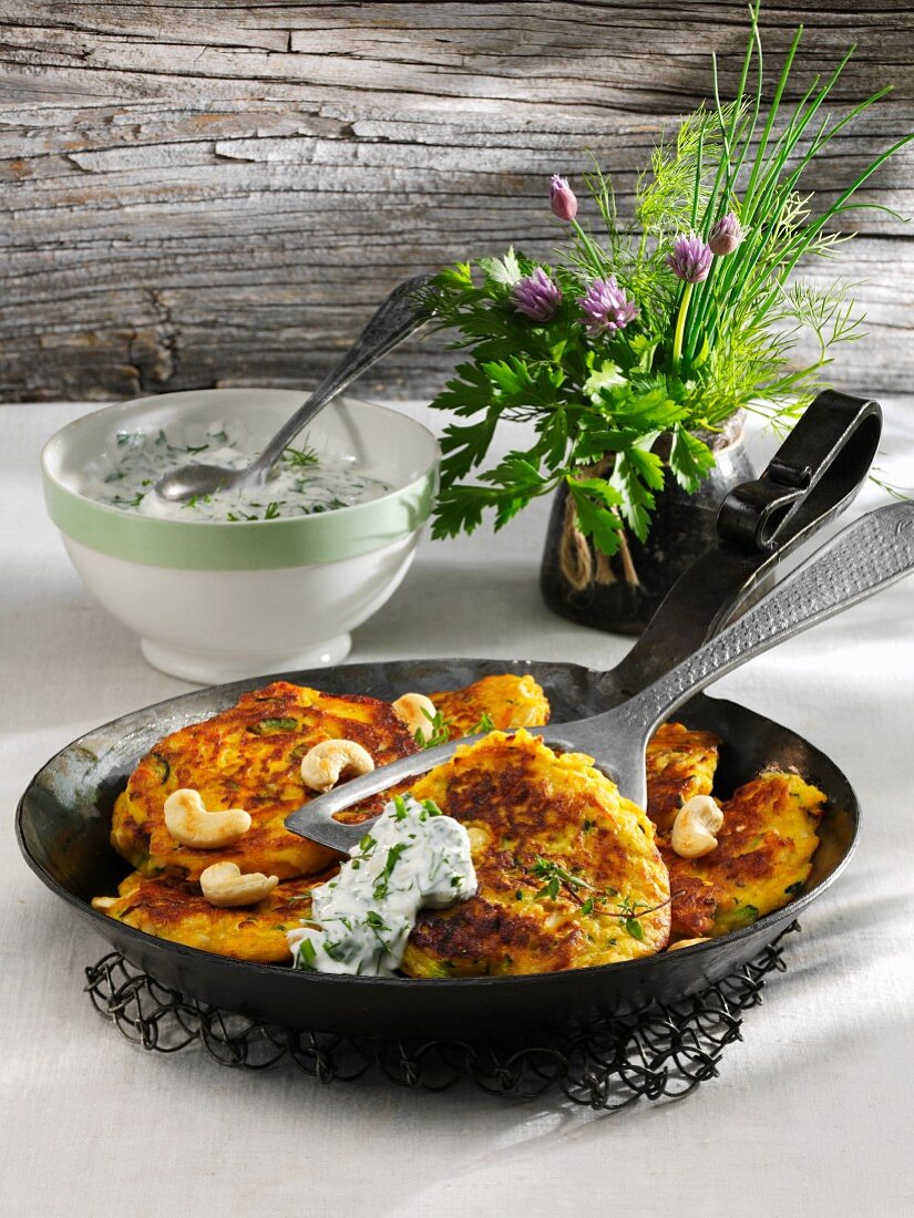 Pumpkin and courgette cakes with herb yogurt