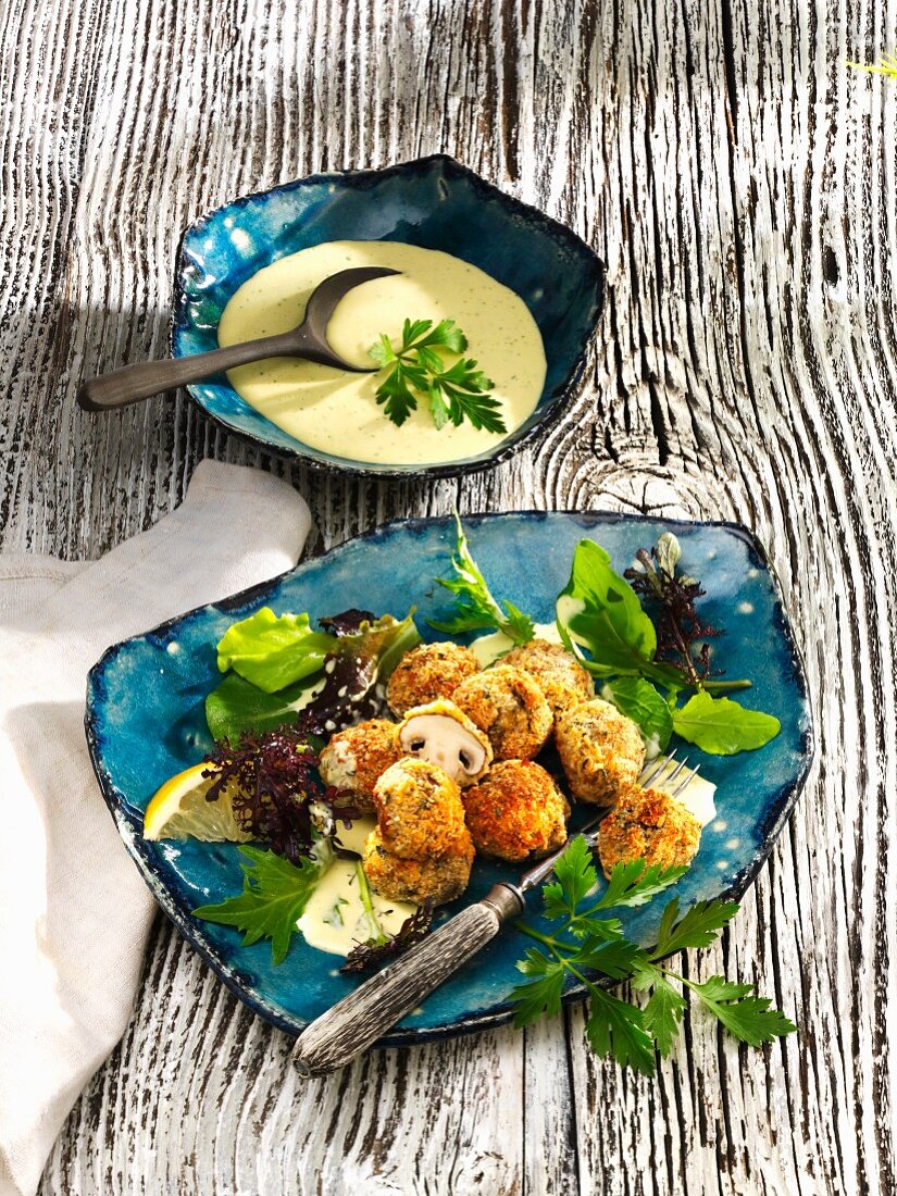 Breaded mushrooms with garlic sauce