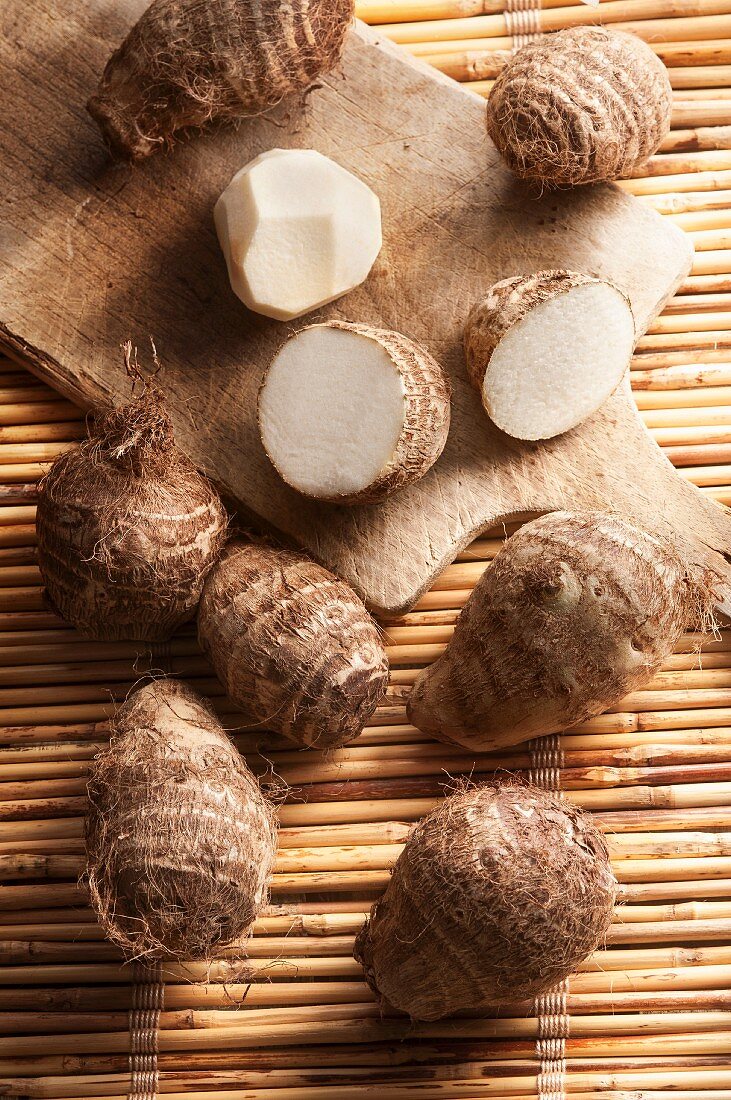 Taro roots, whole and halved