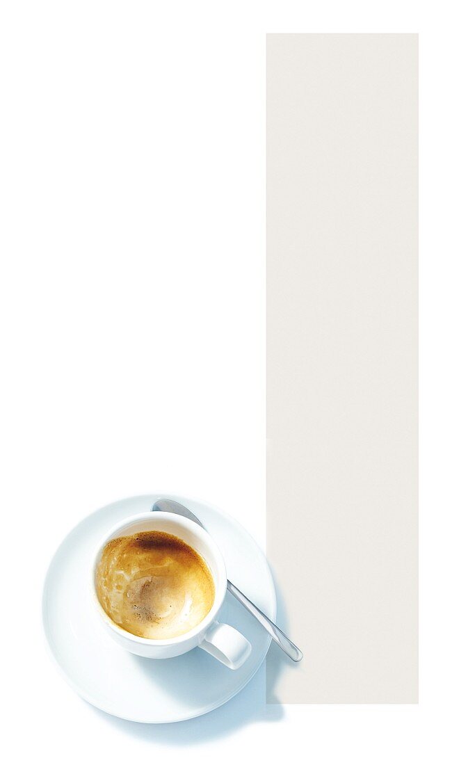 Eine leergetrunkene Espressotasse (Aufsicht)