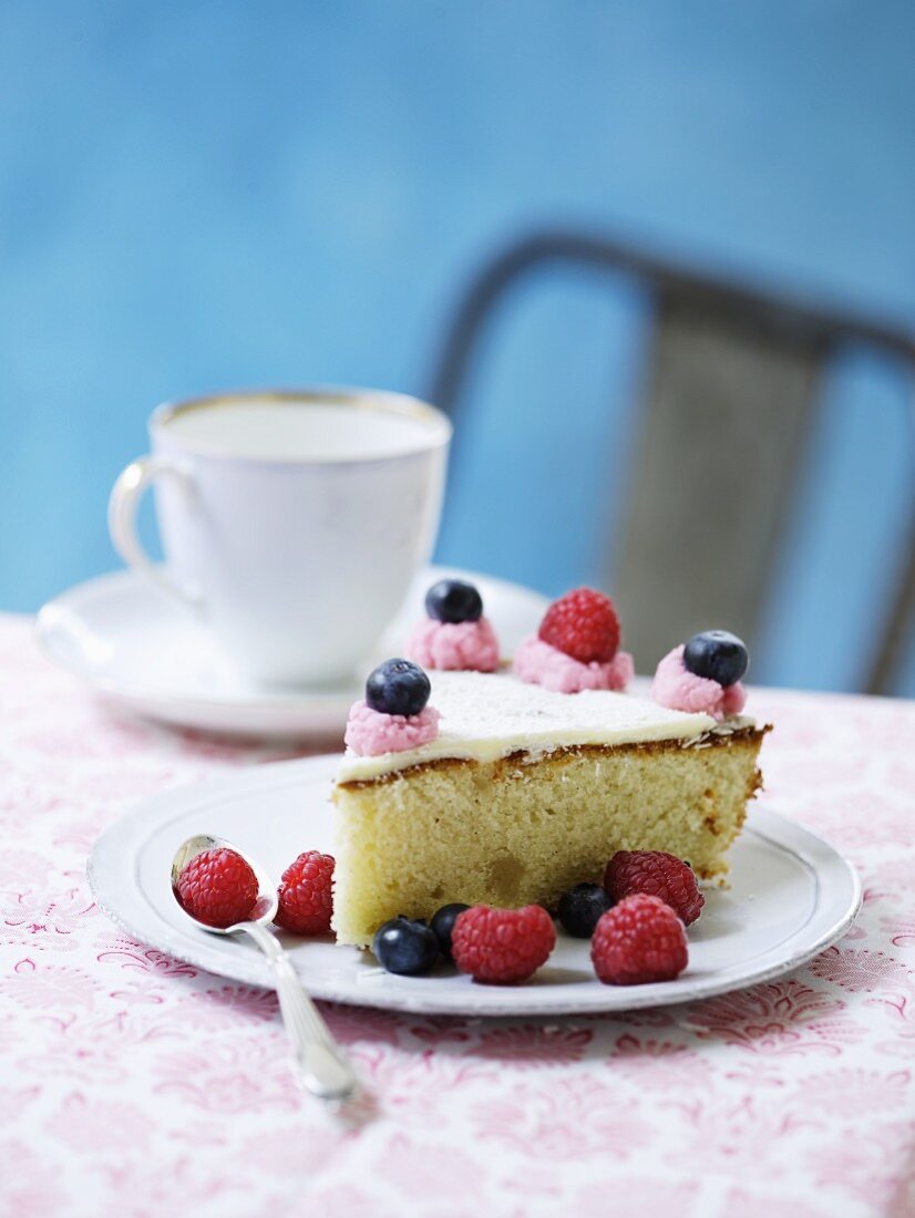 A slice of berry cake with icing