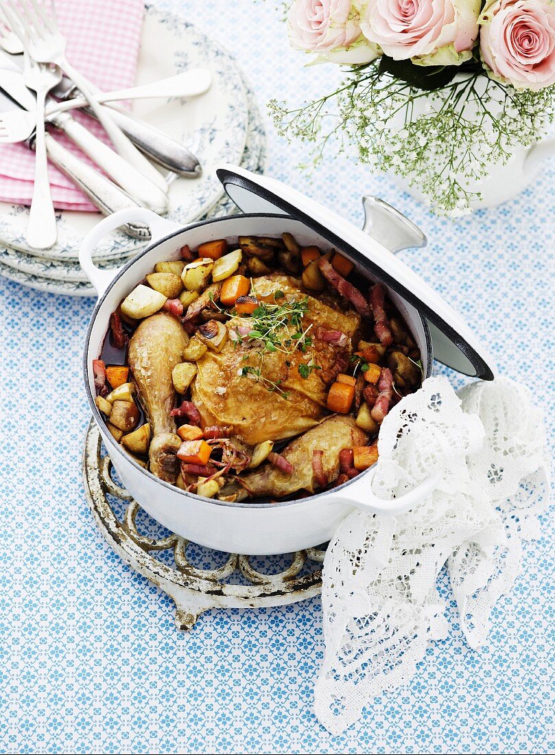 Coq au vin in a casserole pot