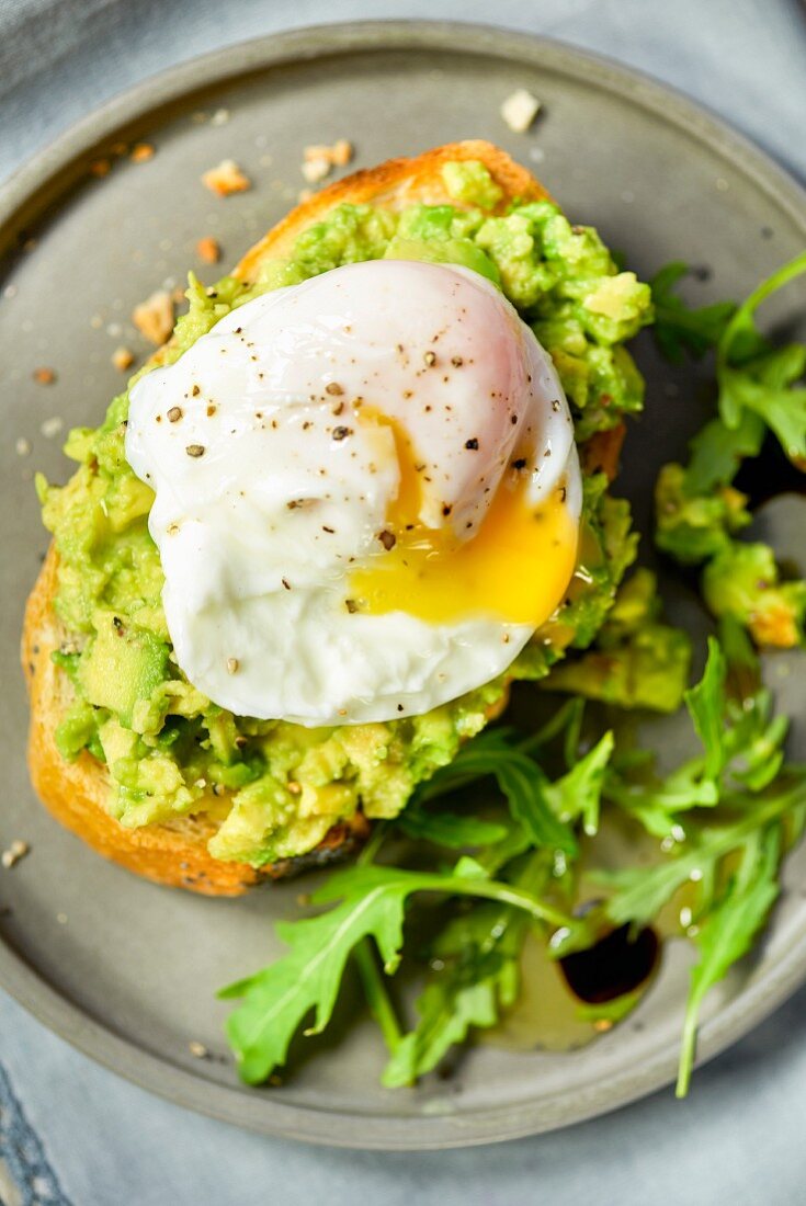 Avocado and a poached egg on toast
