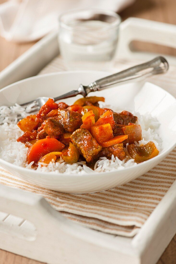 Beef goulash on a bed of rice