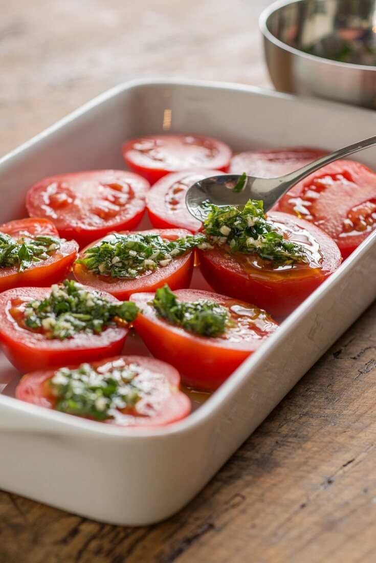 Oven-roasted tomatoes being prepared
