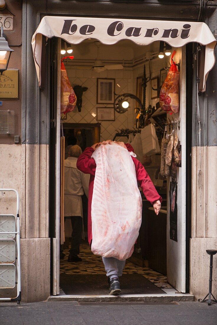 The entrance of a butcher's, Italy